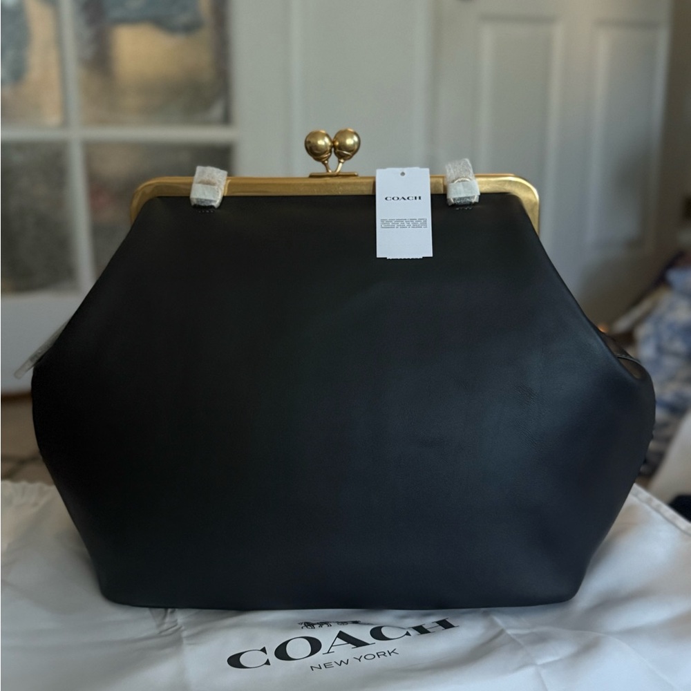 Coach Black and Gold Women's Shoulder Bag

Large Kisslock Frame Bag
Brass/Black